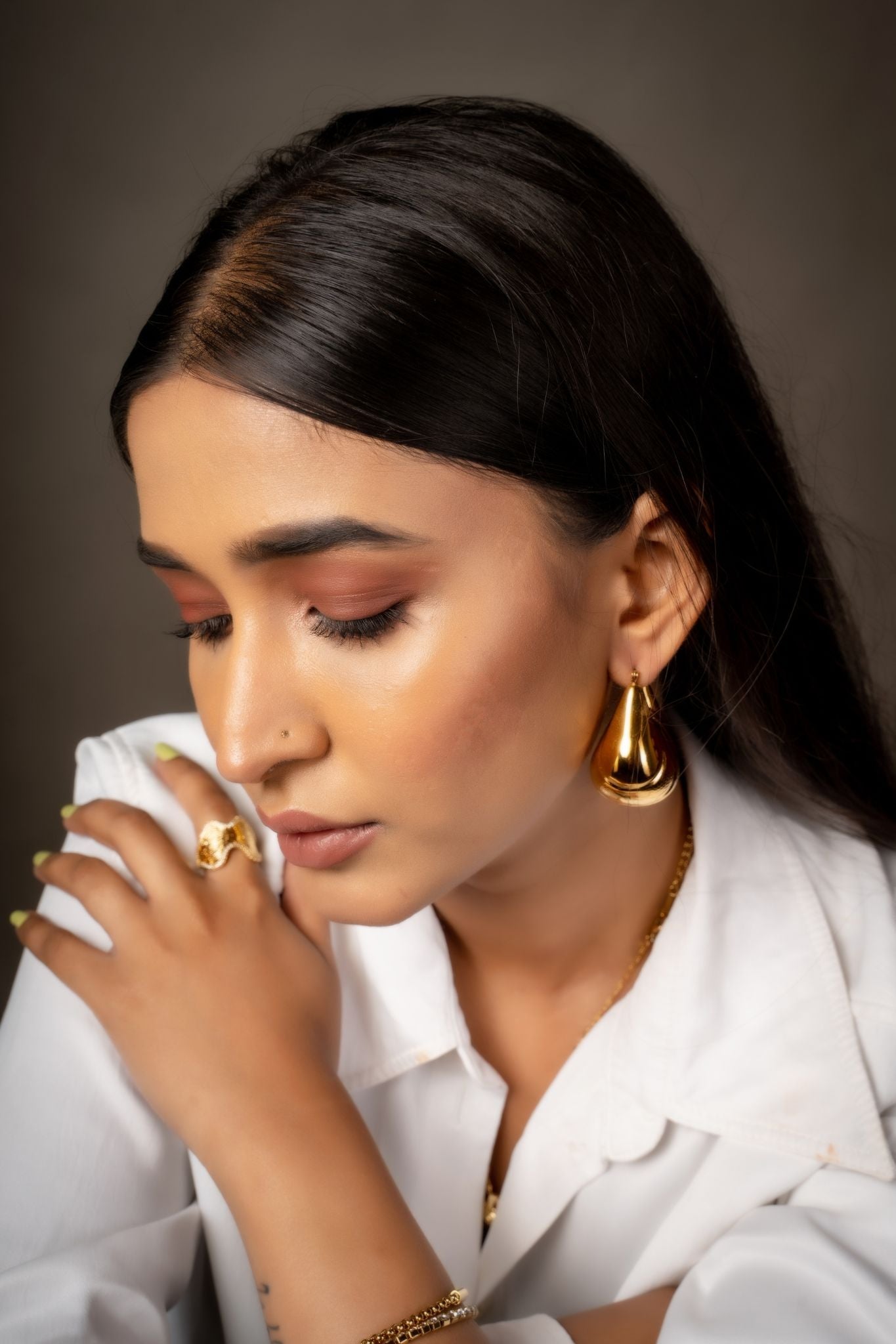 Gold plated hollow sector earrings