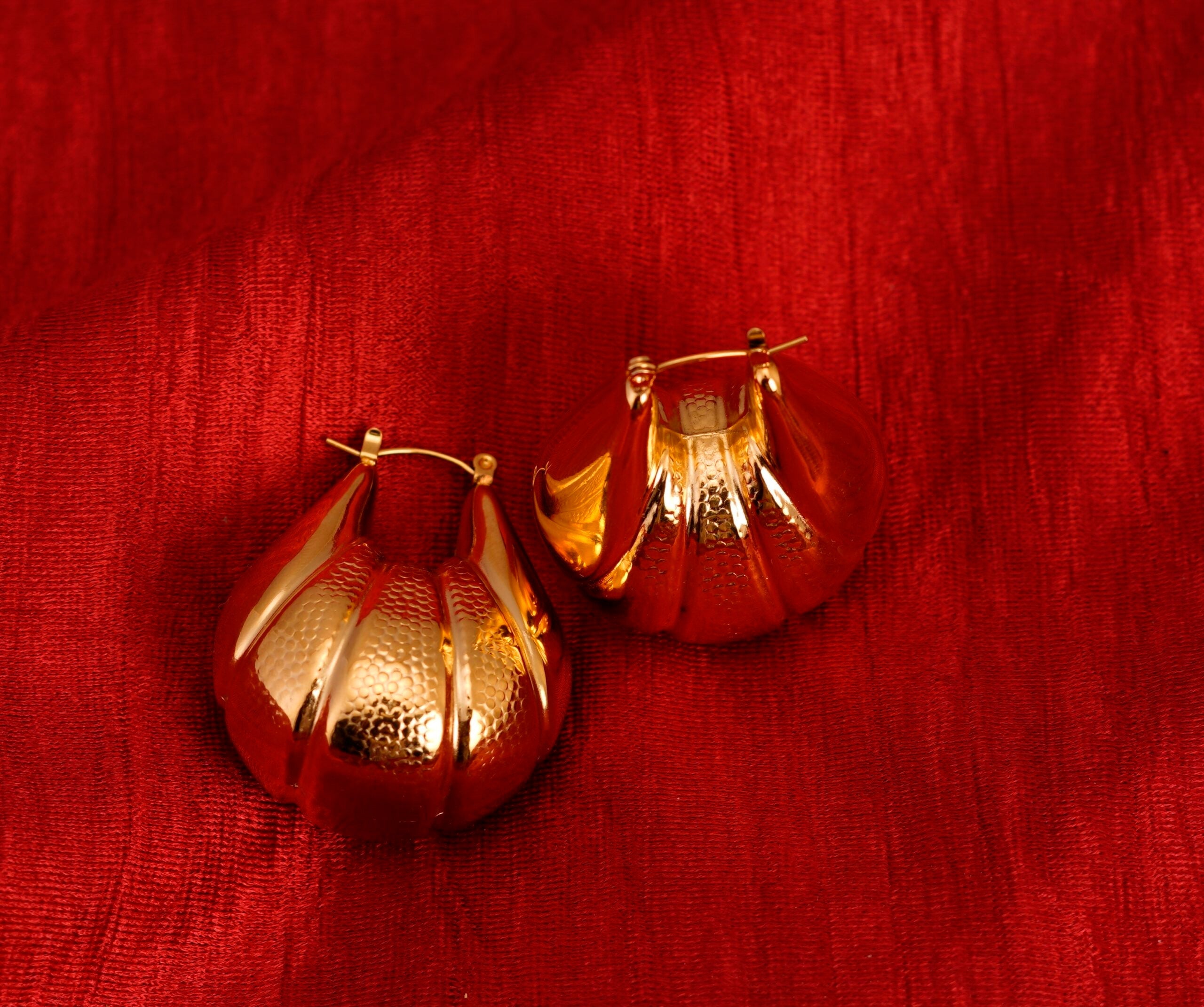 Gold plated hollow sector earrings