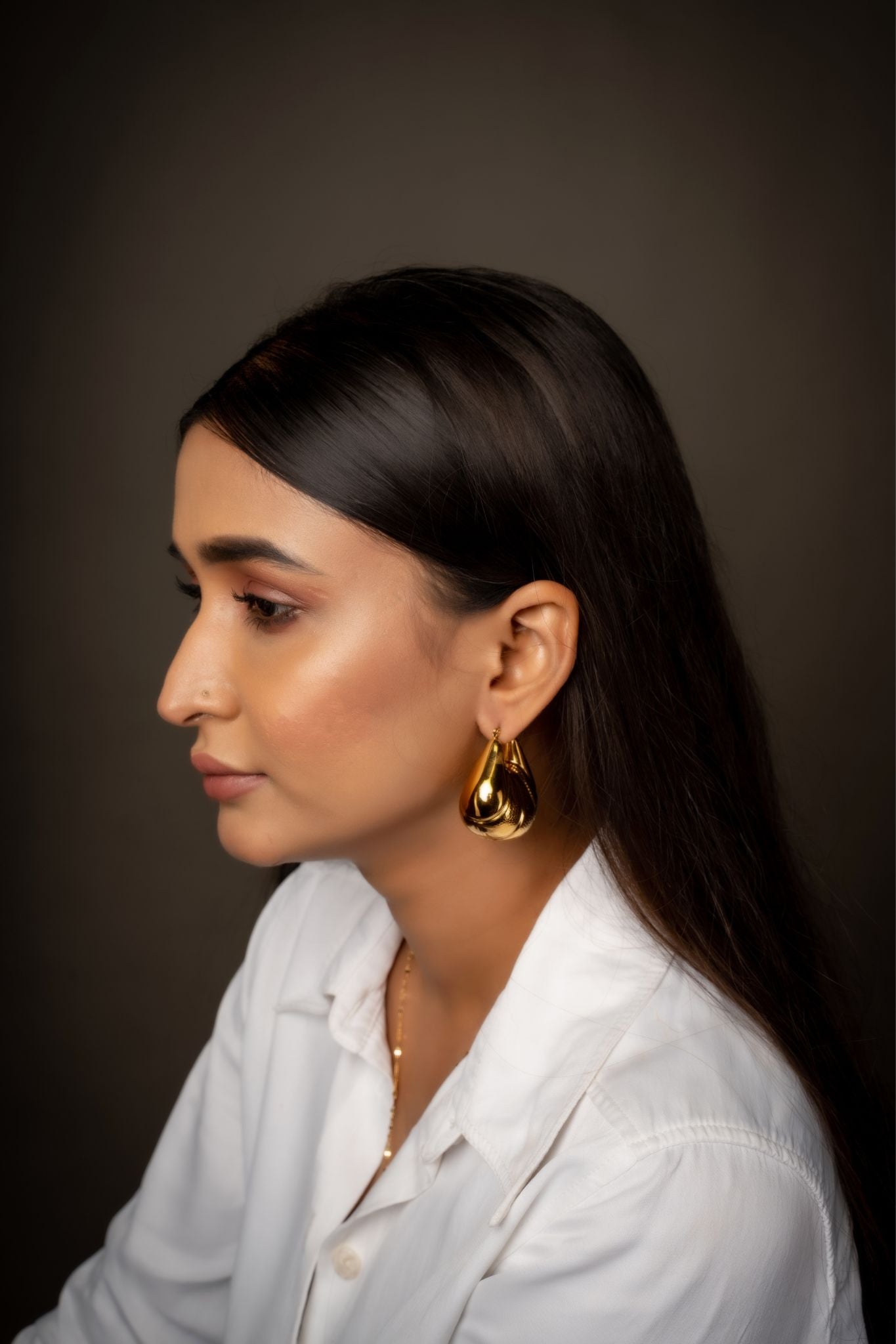 Gold plated hollow sector earrings