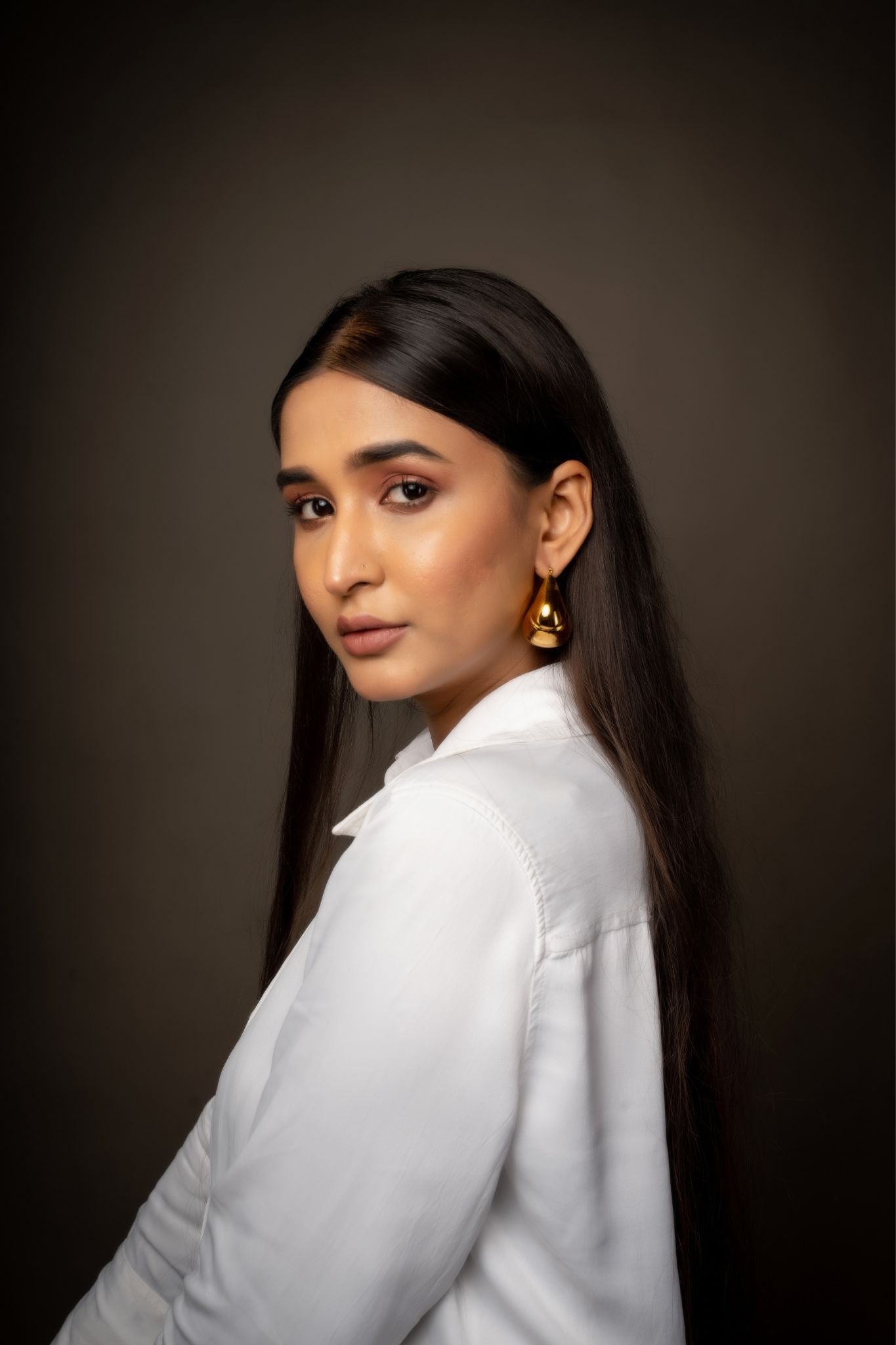 Gold plated hollow sector earrings