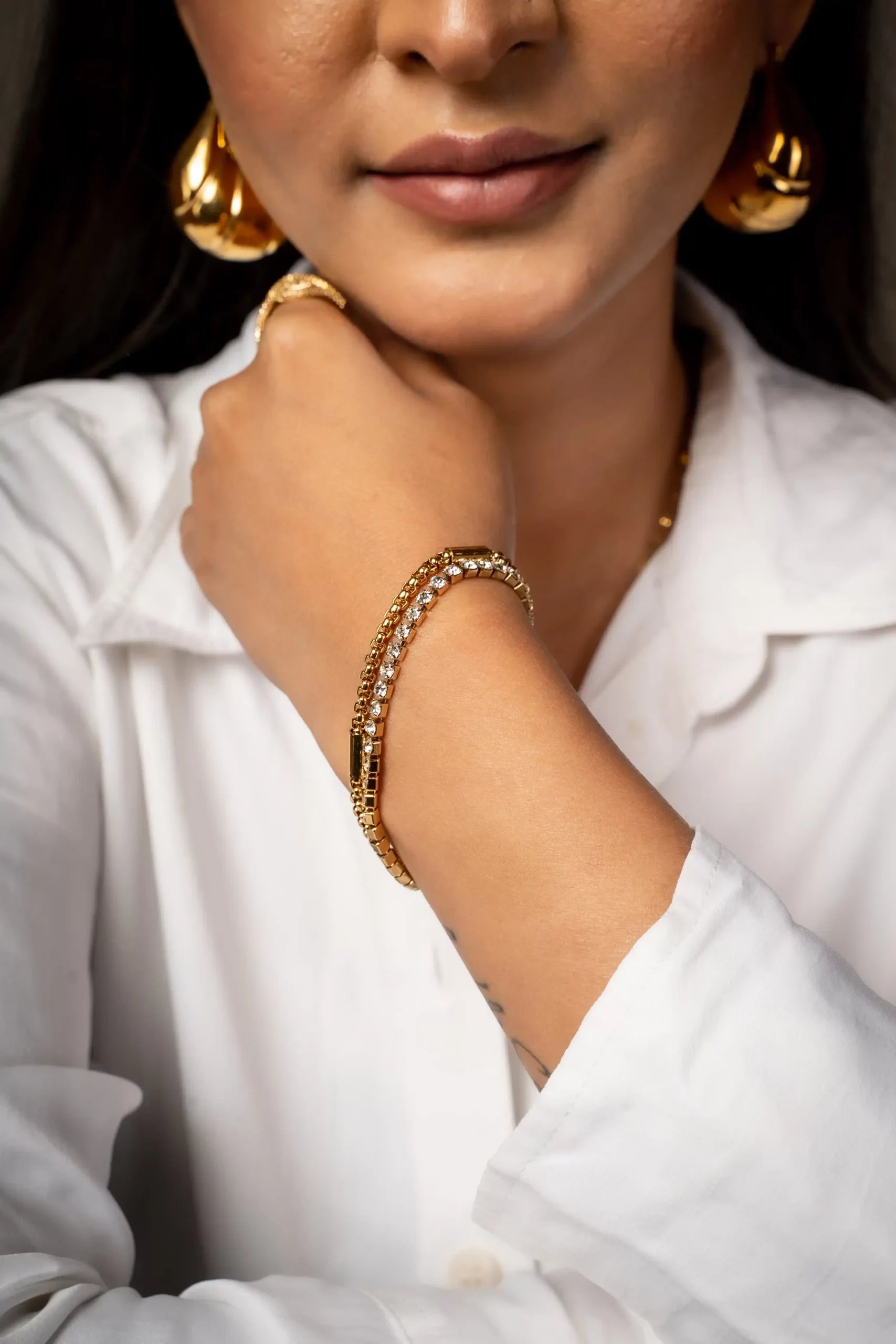 Double layer bracelet with studded rhinestones