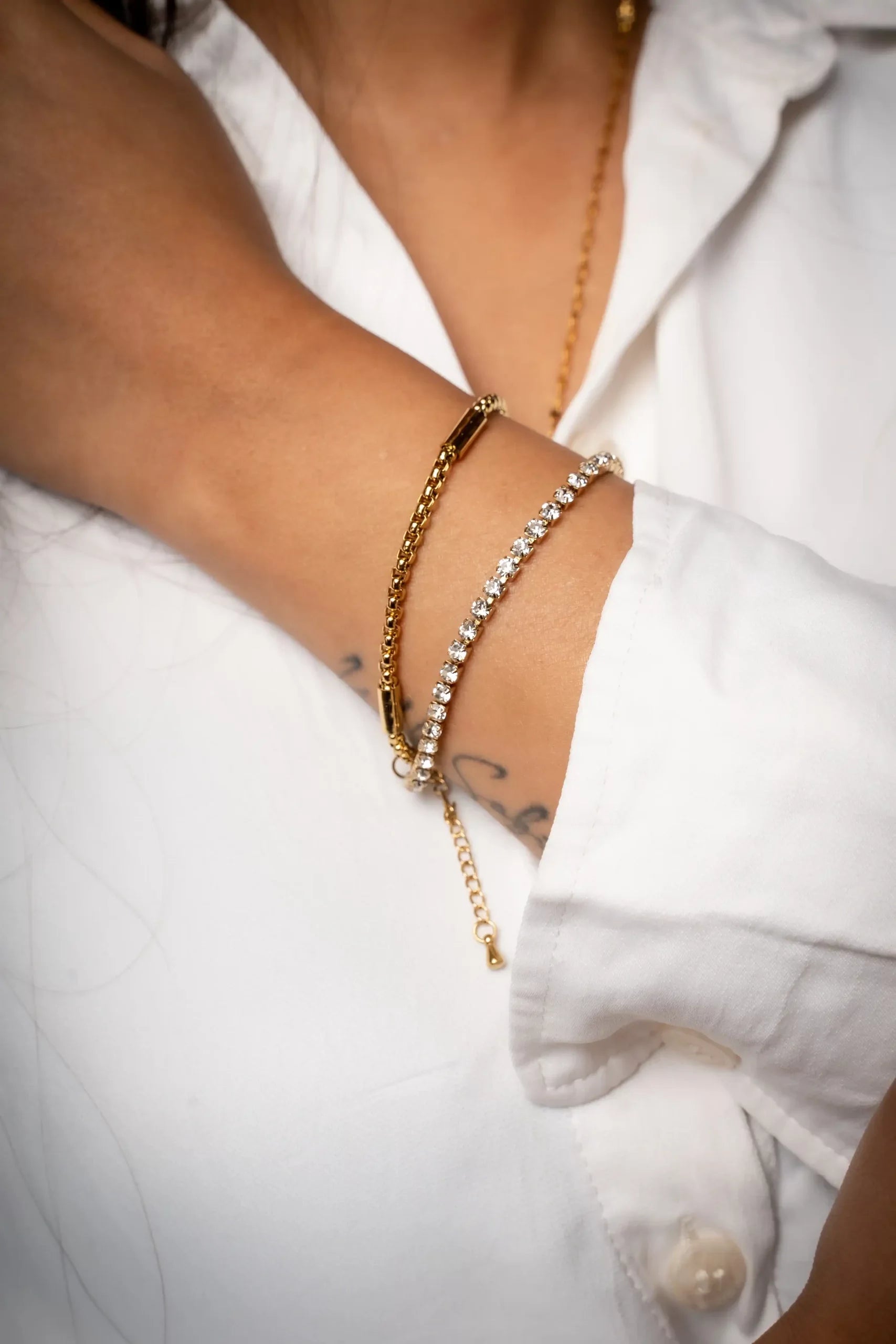 Double layer bracelet with studded rhinestones